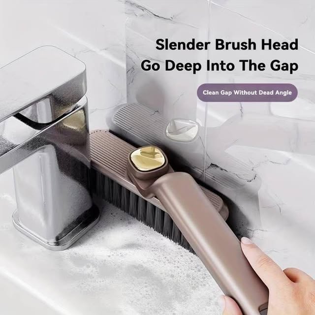 Slim brush head reaches into the gap around the tap